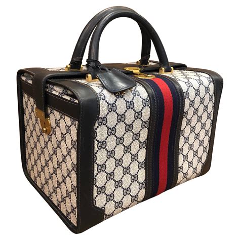 gucci luggage sale.